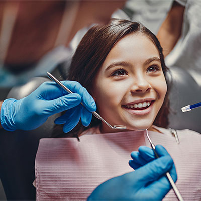 Child sitting in the dentists chair