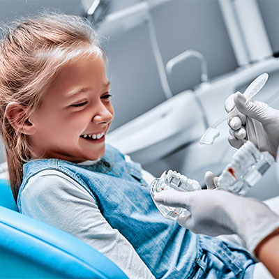 Child sitting in the dentists chair
