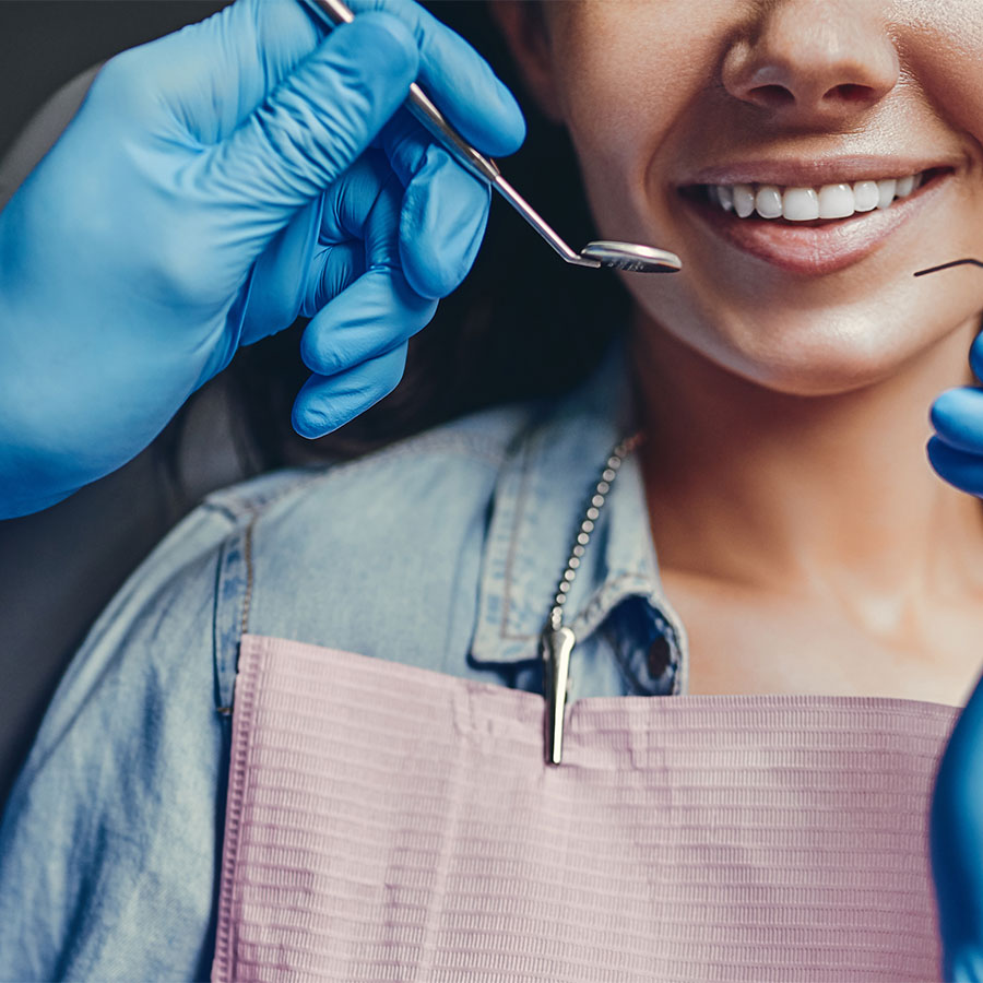 Photo of a person in the dental chair